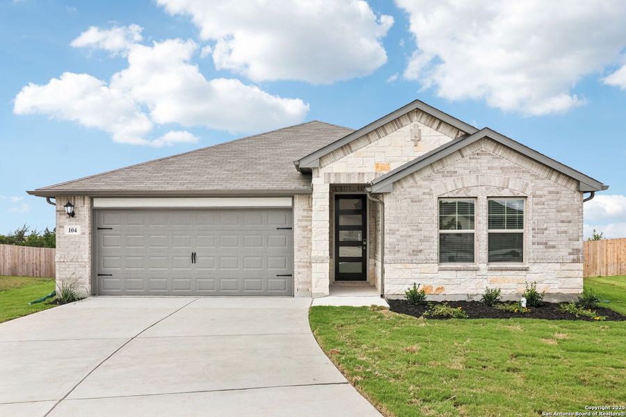 Front exterior of a new home in Legendary Trails - Classic Series, Cibolo, TX, highlighting curb appeal (Image 22).