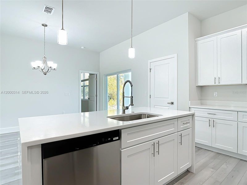 Furnished interior view inside a new home in , Port Charlotte (Image 5).