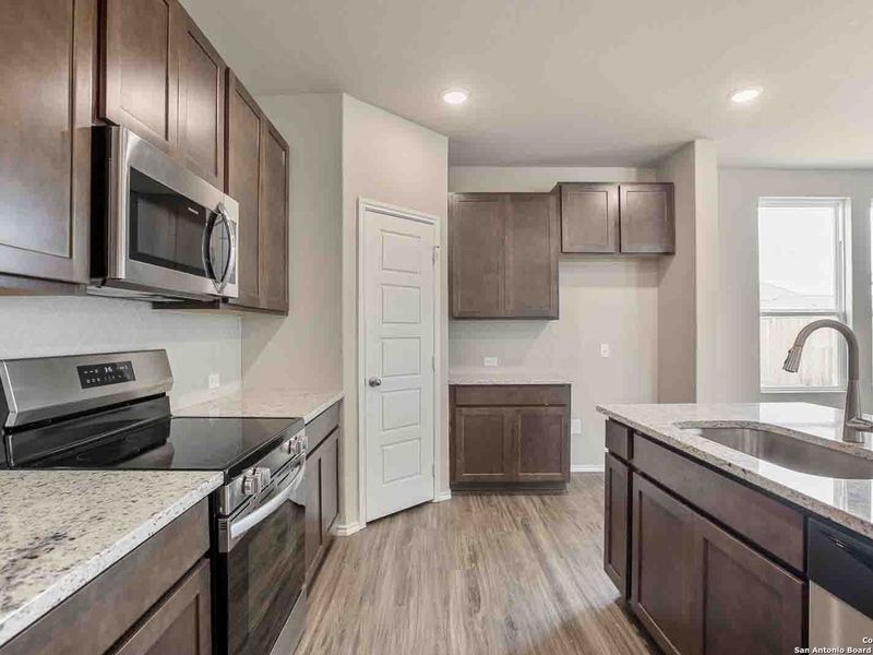 Furnished interior view inside a new home in Hannah Heights, Seguin (Image 9).