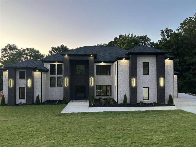 Front exterior of a new home in , Dacula, GA, highlighting curb appeal (Image 2).