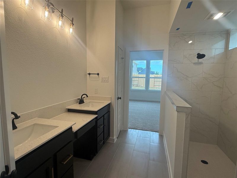 Relax in your main bathroom which included double vanities and a huge mud set shower. Relax in your main bathroom which included double vanities and a huge mud set shower.