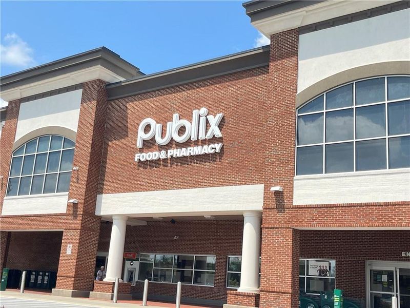 Front exterior of a new home in Liberty Springs, Woodstock, GA, highlighting curb appeal (Image 27). Front exterior of a new home in Liberty Springs, Woodstock, GA, highlighting curb appeal (Image 27).