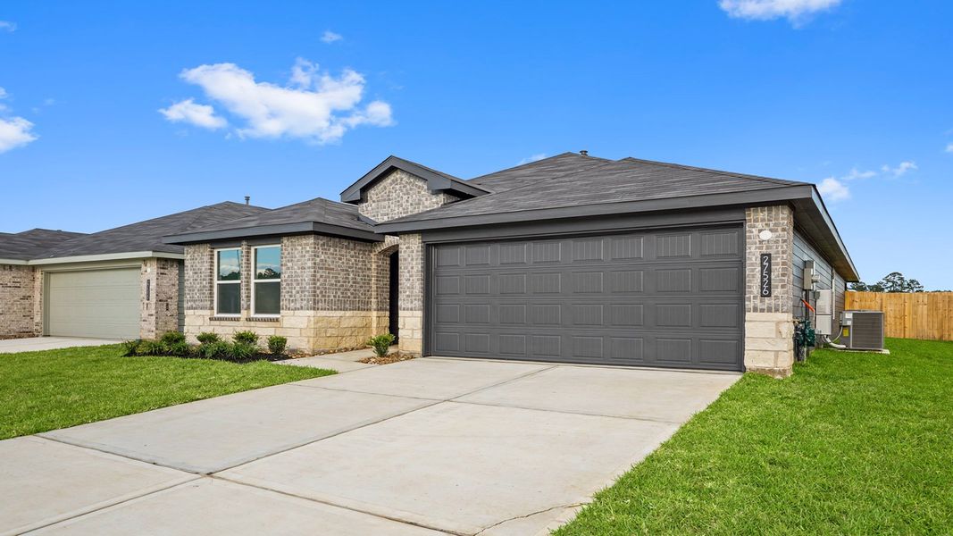 Representative exterior photo of a completed home built from the Gavin by D.R. Horton in Grand Pines, Magnolia, TX (Image 2). Representative exterior photo of a completed home built from the Gavin by D.R. Horton in Grand Pines, Magnolia, TX (Image 2).