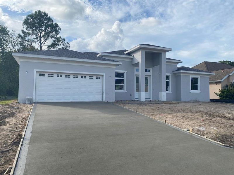 Exterior details and patio area of a home in , Palm Coast (Image 2). Exterior details and patio area of a home in , Palm Coast (Image 2).