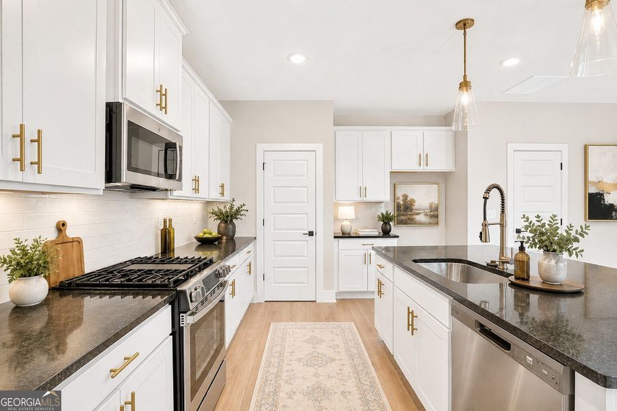 Furnished interior view inside a new home in The Fairways at Mirror Lake, Villa Rica (Image 12).