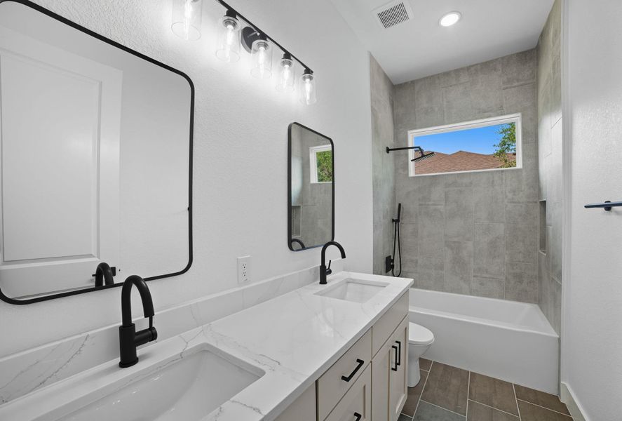 Full bath with double vanity and shower combination Full bath with double vanity and shower combination