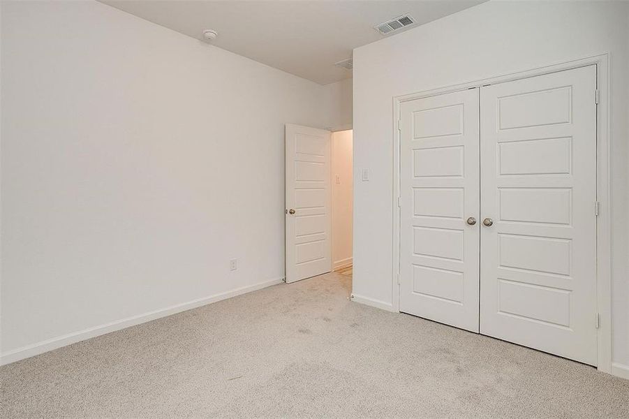 Bedroom #2 located downstairs