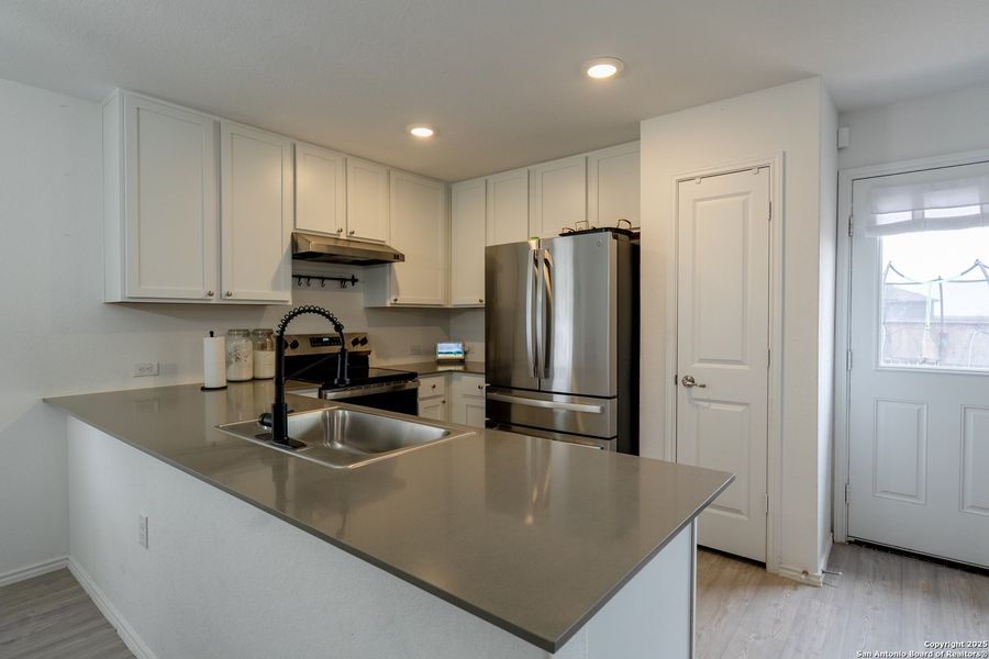 Furnished interior view inside a new home in Mission del Lago: Cottage Collection, San Antonio (Image 7).