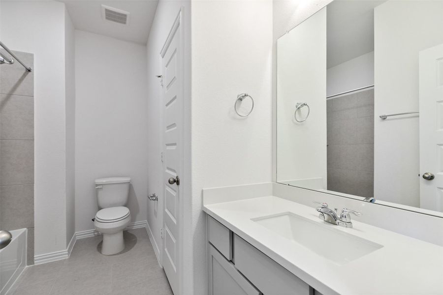 Furnished interior view inside a new home in Westland Ranch, League City (Image 9).