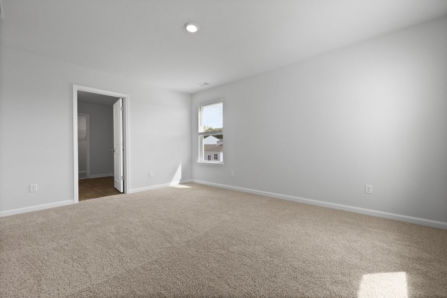 Spacious, unfurnished interior of a new home in Pine Hills at Cane Bay, Summerville (Image 14).