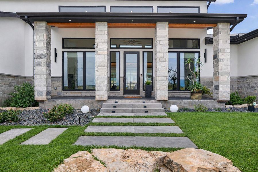 Exterior details and patio area of a home in , Spicewood (Image 3).