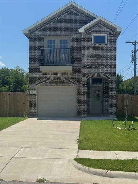 Front exterior of a new home in , Greenville, TX, highlighting curb appeal (Image 2). Front exterior of a new home in , Greenville, TX, highlighting curb appeal (Image 2).