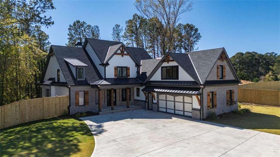 Front exterior of a new home in , Cumming, GA, highlighting curb appeal (Image 31).