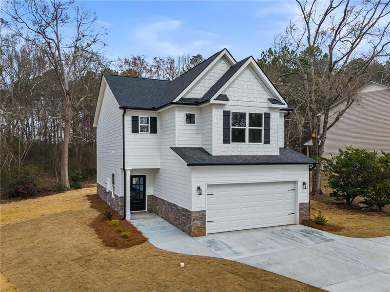 Front exterior of a new home in , Commerce, GA, highlighting curb appeal (Image 16).