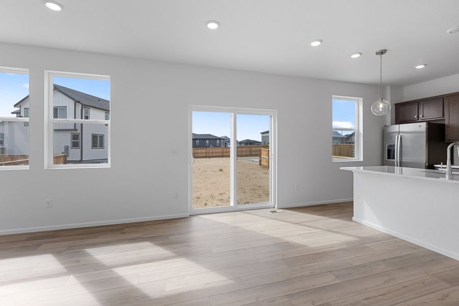Spacious, unfurnished interior of a new home in The Cottages Collection at Ridgeline Vista, Brighton (Image 11).