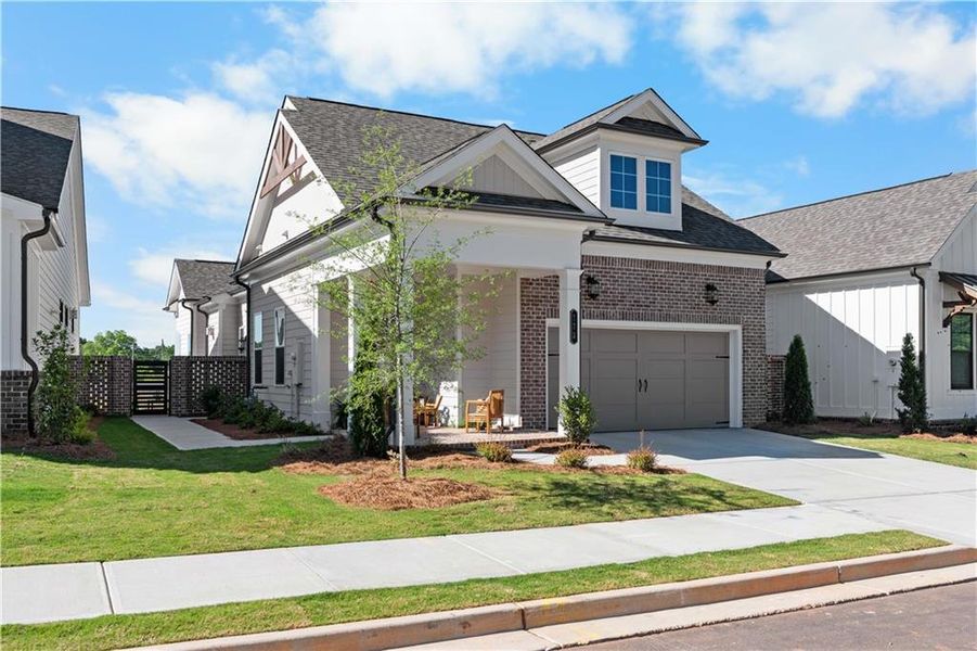Front exterior of a new home in Aberdeen, Hoschton, GA, highlighting curb appeal (Image 26). Front exterior of a new home in Aberdeen, Hoschton, GA, highlighting curb appeal (Image 26).