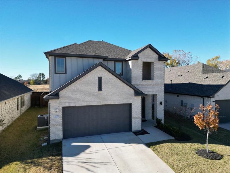 Front exterior of a new home in , Forney, TX, highlighting curb appeal (Image 3).