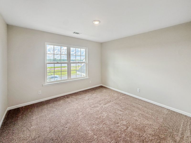 Spacious, unfurnished interior of a new home in The Village at Sassafras, Allenhurst (Image 22).
