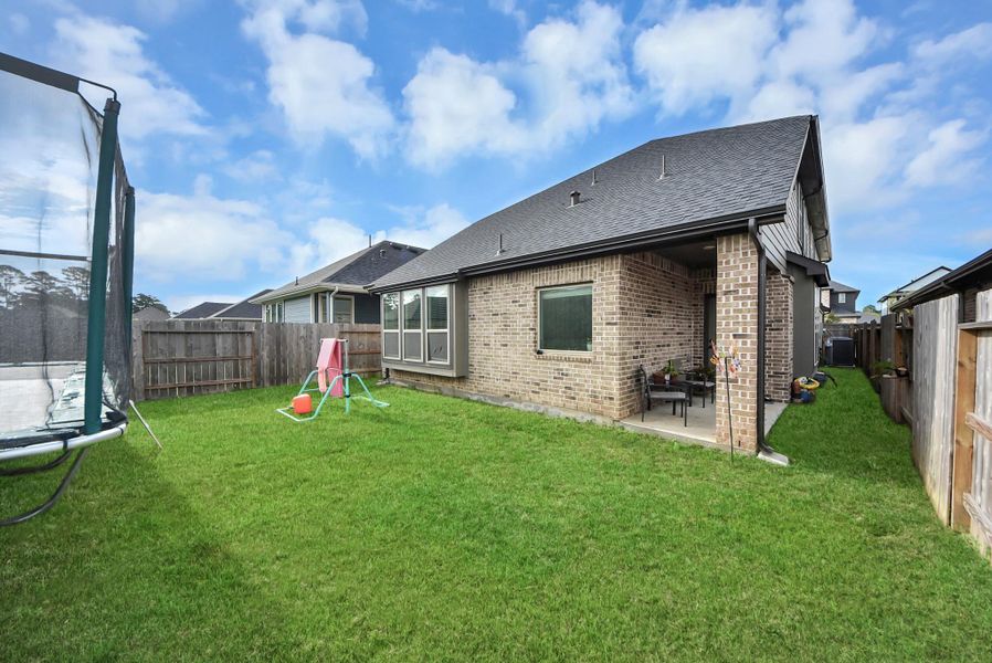 Spacious backyard for playing or relaxing