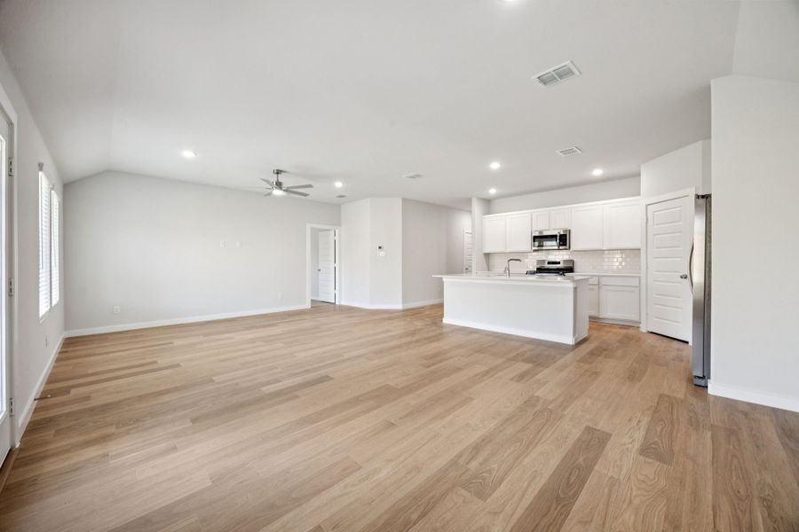 Open Floor Plan in the Emmy II home plan by Trophy Signature Homes - REPRESENTATIVE PHOTO Open Floor Plan in the Emmy II home plan by Trophy Signature Homes - REPRESENTATIVE PHOTO