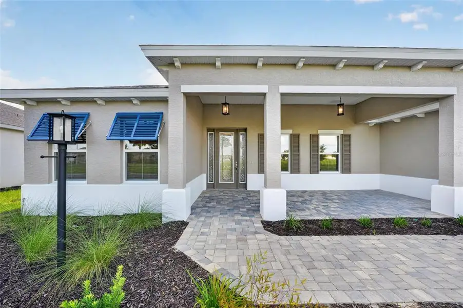 Exterior details and patio area of a home in , Ocala (Image 33).