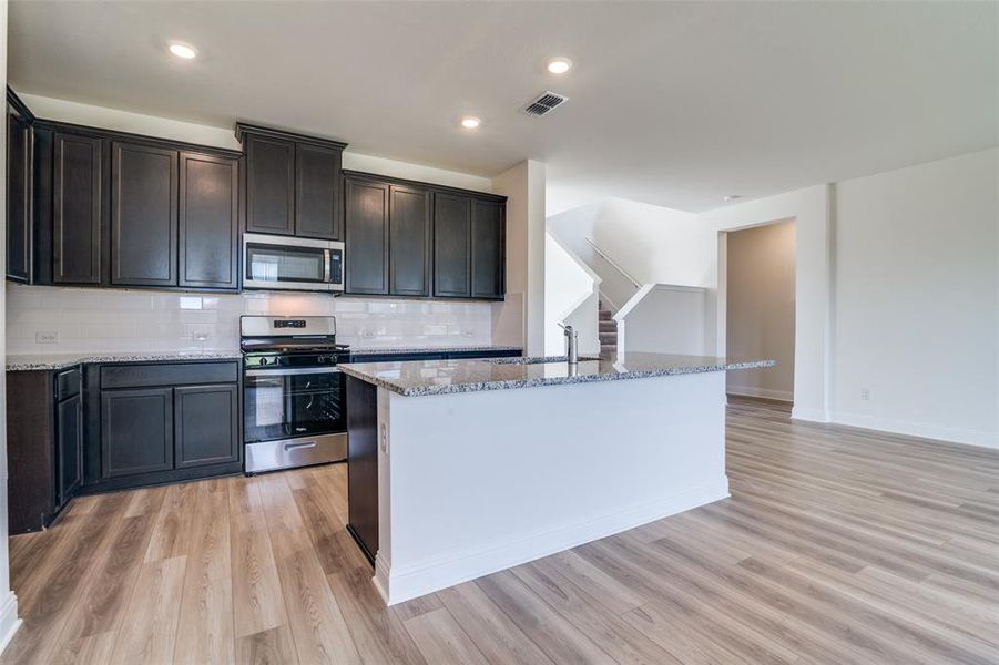 Furnished interior view inside a new home in Heartland, Crandall (Image 6).