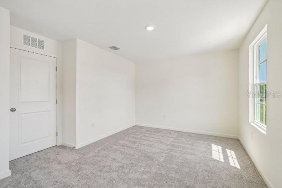 Spacious, unfurnished interior of a new home in Baywood Hills, Alachua (Image 14).