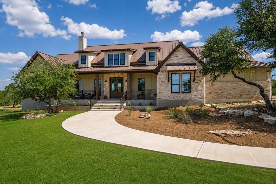 Front exterior of a new home in , Johnson City, TX, highlighting curb appeal (Image 2). Front exterior of a new home in , Johnson City, TX, highlighting curb appeal (Image 2).