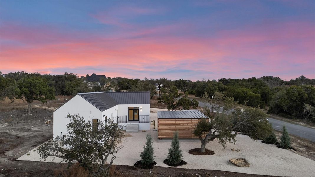 Front exterior of a new home in , Wimberley, TX, highlighting curb appeal (Image 21).