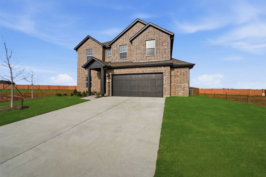 Front exterior of a new home in Saddlebrook Estates, Waxahachie, TX, highlighting curb appeal (Image 26). Front exterior of a new home in Saddlebrook Estates, Waxahachie, TX, highlighting curb appeal (Image 26).