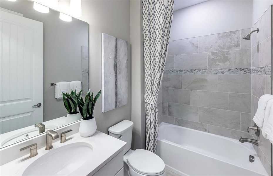 Furnished interior view inside a new home in BeachWalk by Manasota Key, Englewood (Image 10). Furnished interior view inside a new home in BeachWalk by Manasota Key, Englewood (Image 10).