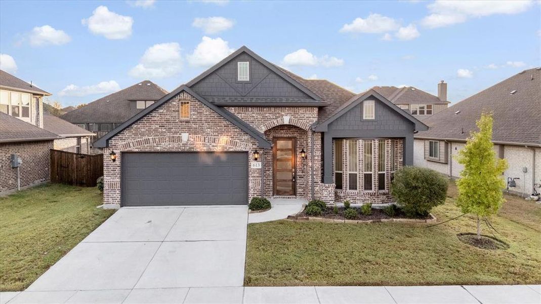 Front exterior of a new home in , Little Elm, TX, highlighting curb appeal (Image 1). Front exterior of a new home in , Little Elm, TX, highlighting curb appeal (Image 1).