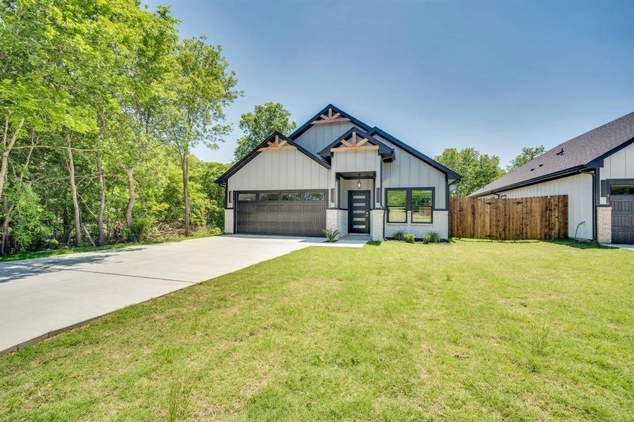 Front exterior of a new home in , Hillsboro, TX, highlighting curb appeal (Image 18).