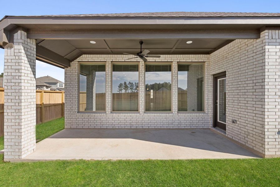 Exterior details and patio area of a home in The Trails 50', New Caney (Image 4).
