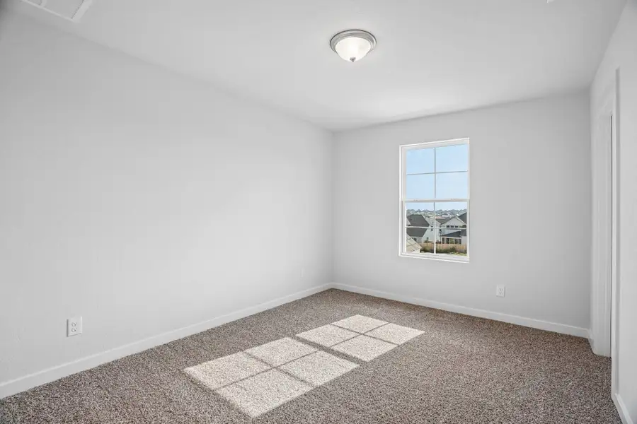 Spacious, unfurnished interior of a new home in The Meadows at Hunters Ranch, San Antonio (Image 37).
