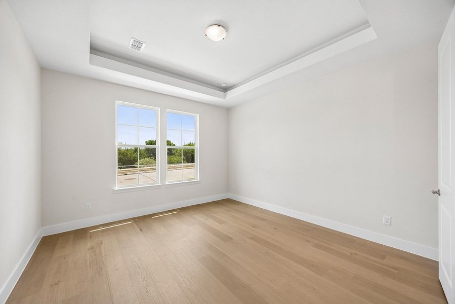 Representative unfurnished interior of a home built from the Mirella by Landon Homes in Fields - East Village, Frisco (Image 22). Representative unfurnished interior of a home built from the Mirella by Landon Homes in Fields - East Village, Frisco (Image 22).
