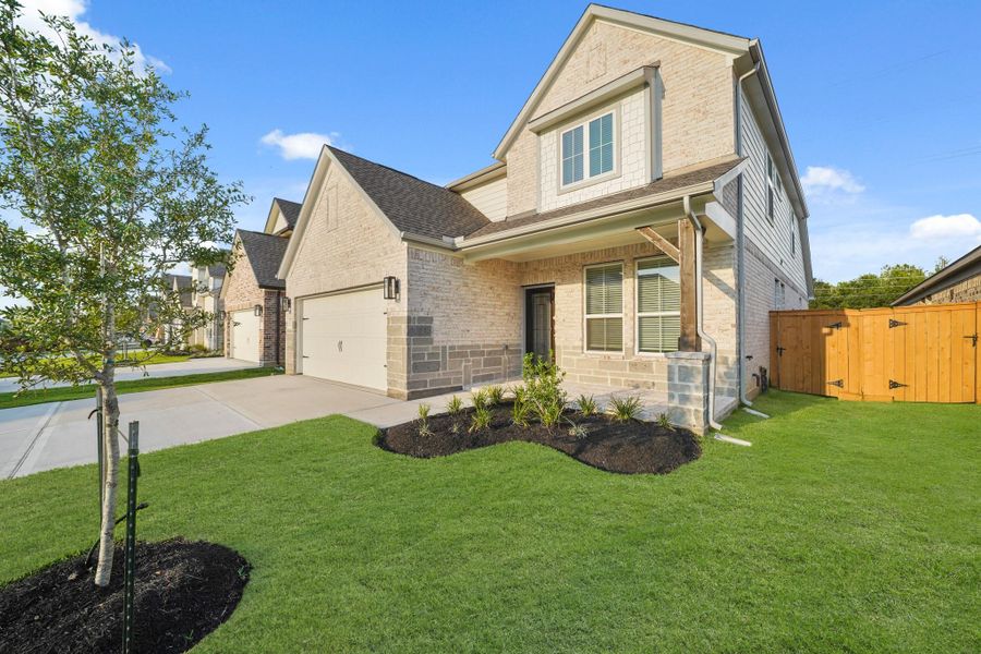 Exterior details and patio area of a home in Sunterra, Katy (Image 3).