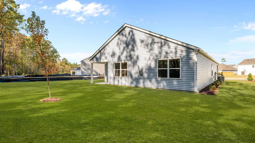 Exterior details and patio area of a home in West New Bern, New Bern (Image 20).