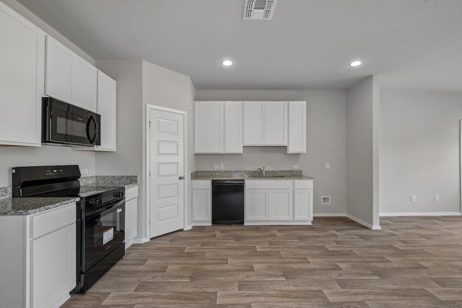 Furnished interior view inside a new home in Edgebrooke, Pflugerville (Image 9).