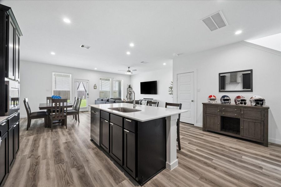 The kitchen is the heart of the home! Great storage closet under the stairs. The kitchen is the heart of the home! Great storage closet under the stairs.