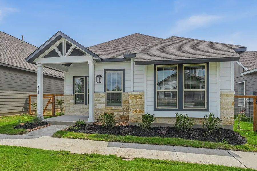 Front exterior of a new home in The Crossvine, Schertz, TX, highlighting curb appeal (Image 22).