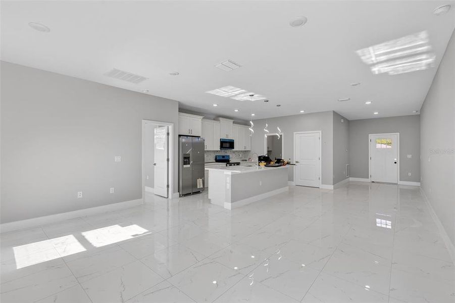Spacious, unfurnished interior of a new home in , Port Charlotte (Image 29).