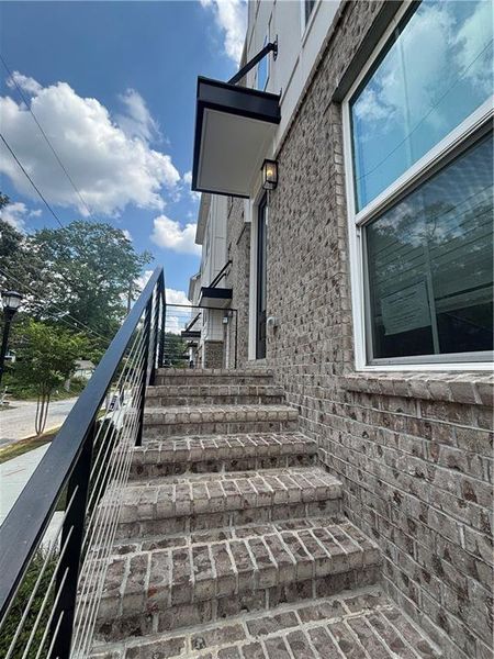 Front exterior of a new home in , Atlanta, GA, highlighting curb appeal (Image 14).