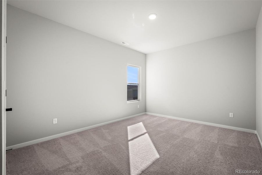 Spacious, unfurnished interior of a new home in Revel Crossing at Wolf Ranch – The Outlook Collection, Colorado Springs (Image 20).