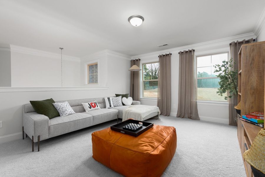 Representative furnished interior of a home built from the Hanover Lux by Keystone Homes NC in Weybridge, Burlington (Image 40).