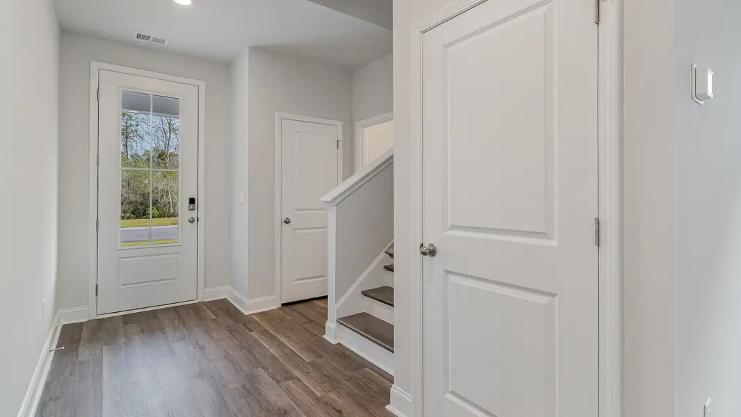 Spacious, unfurnished interior of a new home in The Preserve at Shaftesbury Glen, Conway (Image 7).