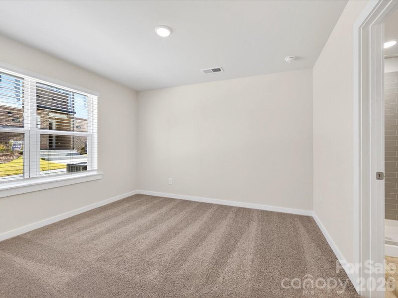 Spacious, unfurnished interior of a new home in Central Living at Craig, Charlotte (Image 20).