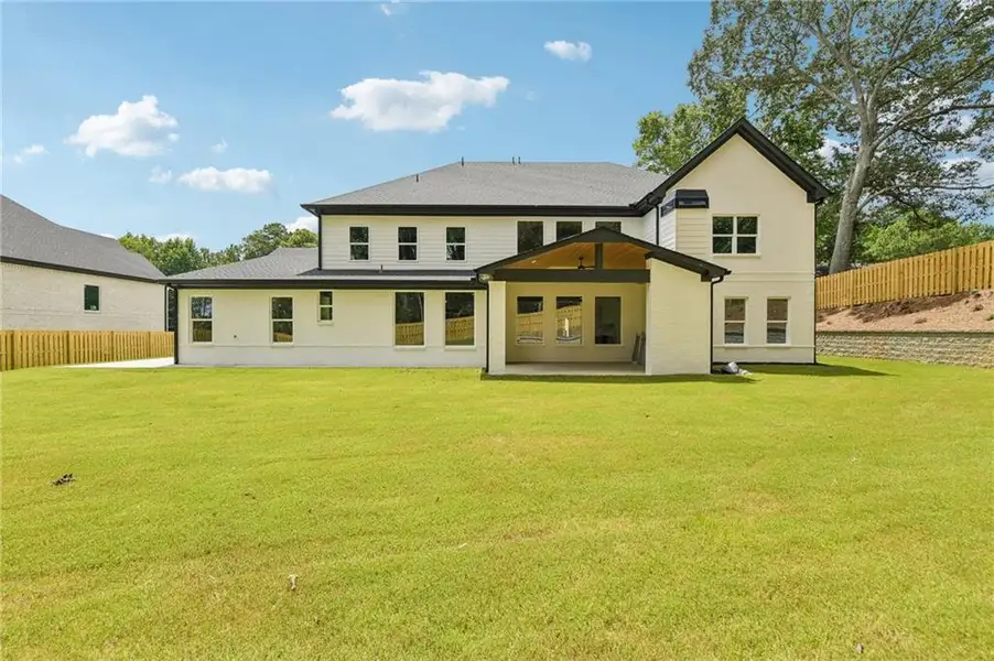 Exterior details and patio area of a home in , Hoschton (Image 31).