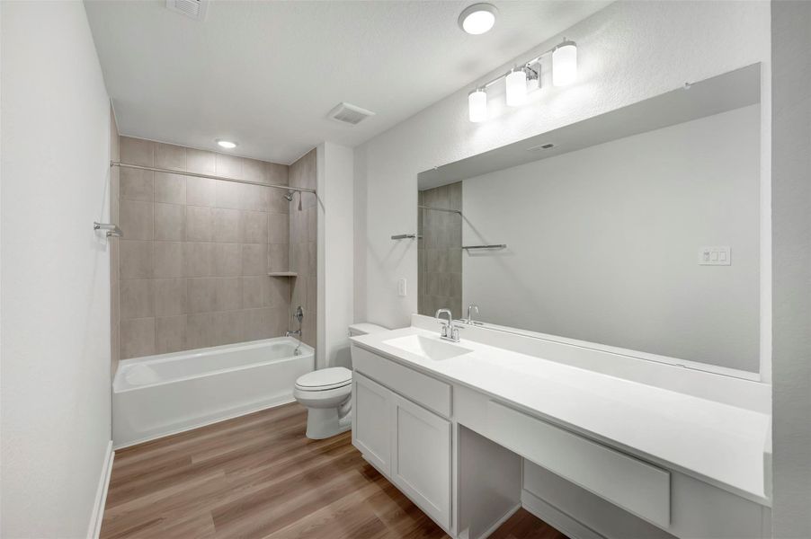 Furnished interior view inside a new home in Wildrye, Waller (Image 16).