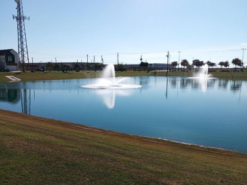 Enjoy walking around the scenic community pond! Enjoy walking around the scenic community pond!